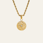 graduation gift. Designed to mirror the points of a compass, the Intuition Necklace is a quiet reminder that while maps can guide you, true direction often comes from within. Staying true to Mettle and Bloom's signature style, it is set on a softly hammered round pendant. The raised star motif draws the eye with its refined shape and the radiant centre stone captures the gaze.