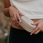 Person holding a luxury jewellery storage case with a blurred background