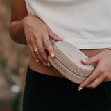 Person holding a luxury jewellery storage case with a blurred background