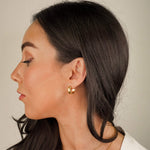 journey hoops available in gold and silver. they are everyday hoop earrings that are waterproof and tarnish resistant. 