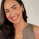 The 'Muse Hoops' from Mettle & Bloom - a pair of double band gold hoop earrings. Crafted with precision, the hoops feature a steel-plated finish for durability and a lustrous appeal. A seamless blend of timeless elegance and contemporary style, these earrings offer a versatile accessory to elevate your look. Available now at Mettle & Bloom, the Muse Hoops embody modern sophistication with their exquisite design.