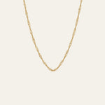A delicate and thin gold singapore chain necklace with a twisted, rope-like link design, displayed against a solid off-white background.